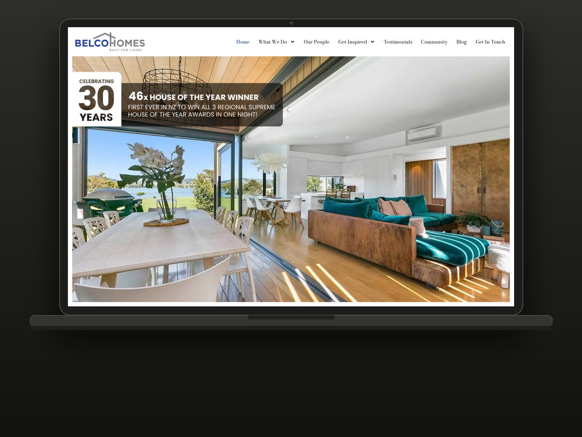 BELCO Homes website on a laptop, built by Bay Web Co