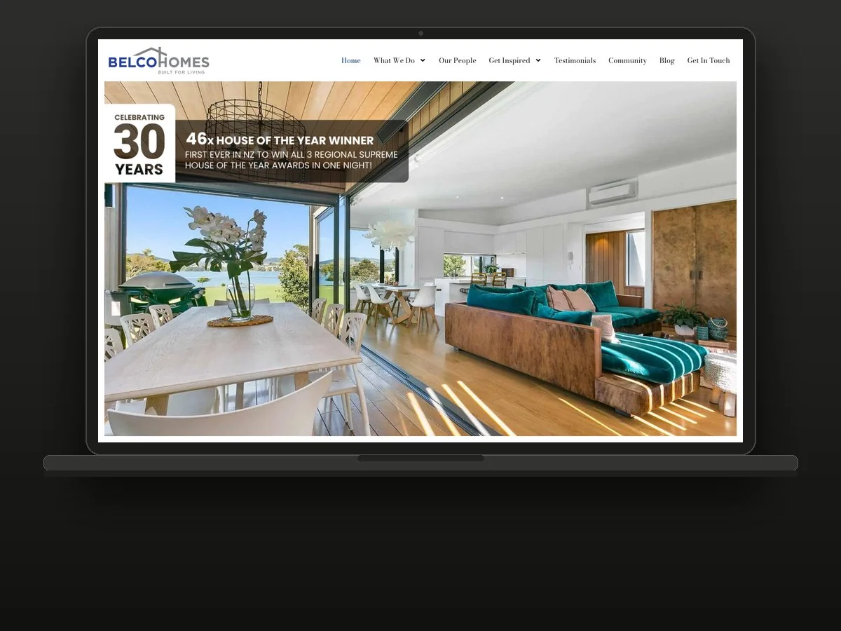 BELCO Homes website on a laptop, built by Bay Web Co